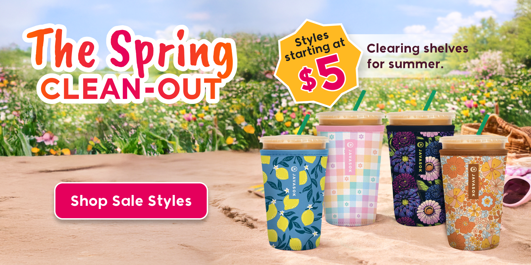 Promotional banner for a spring clean-out sale with colorful javasoks on a wooden surface and garden background.