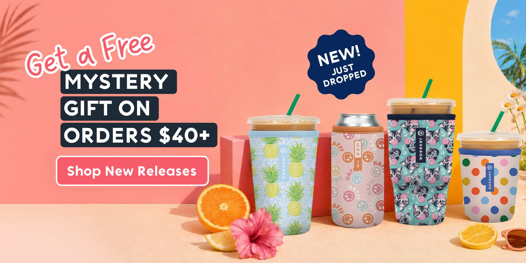 Colorful tumblers with floral and fruit designs on a pink background, promoting a free mystery gift offer.