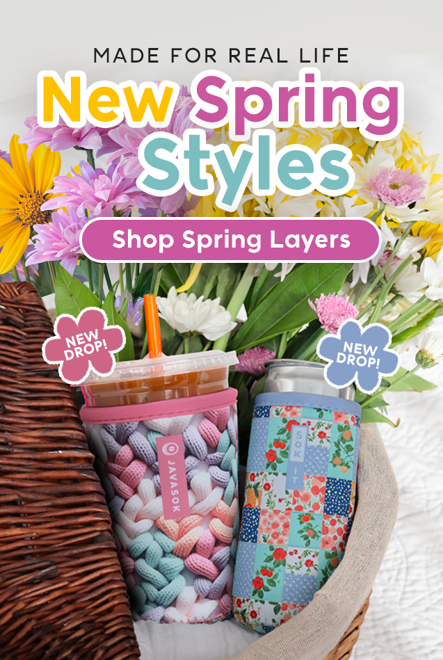 Two colorful drink sleeves with floral designs on a white surface, surrounded by spring flowers and text promoting new spring styles.